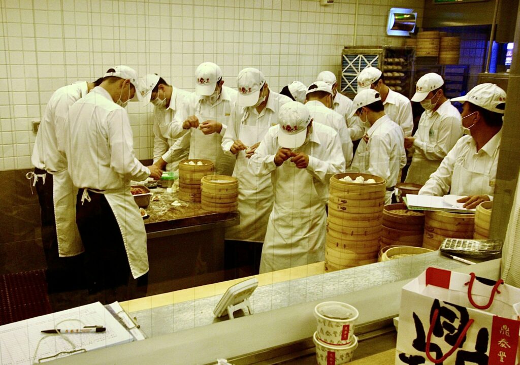 Chefs preparing dumplings