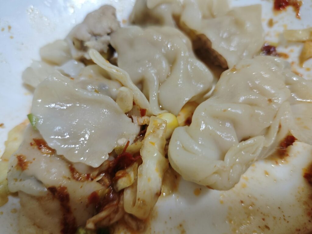 Steamed dumplings with chili oil